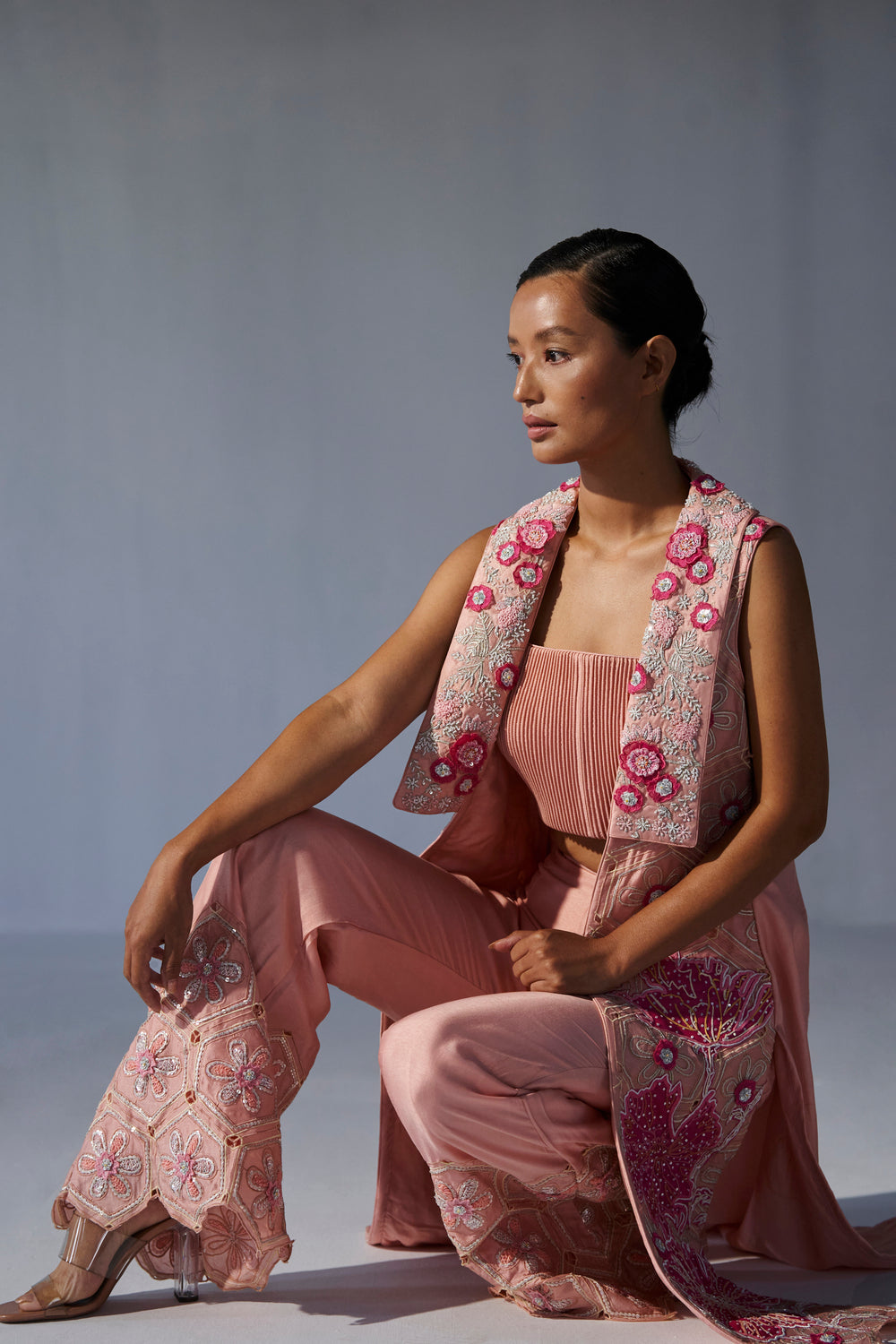 Peach collared jacket with crop top and bell bottoms