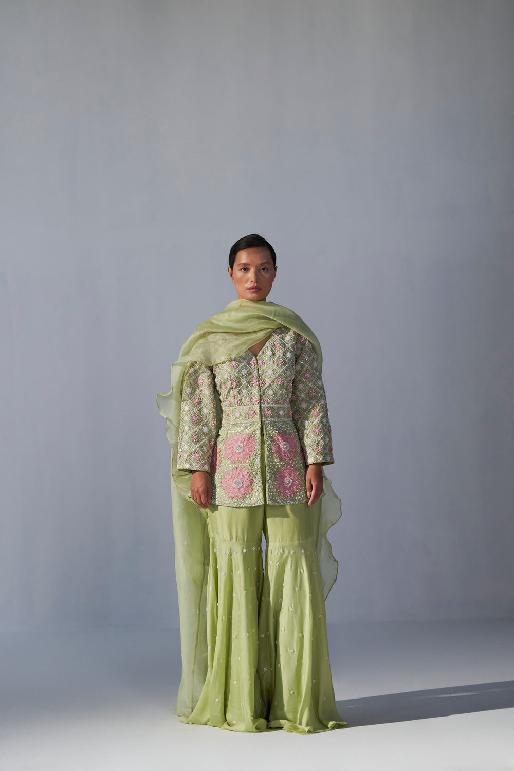 Pista Green peplum top with sharara and organza dupatta