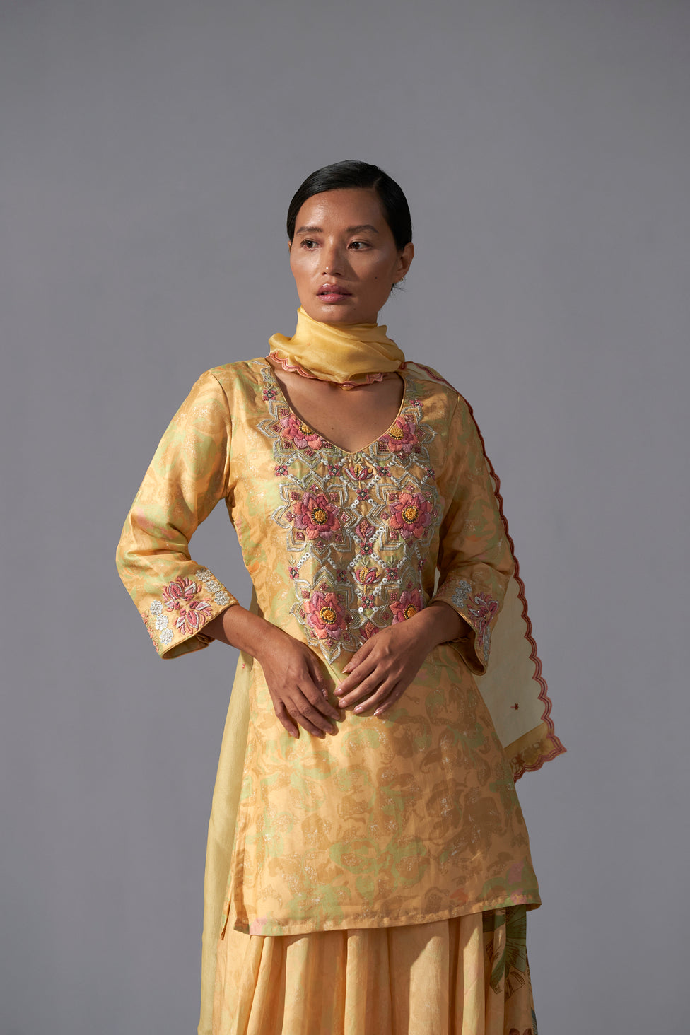 Yellow textured heavy top sharara dupatta set