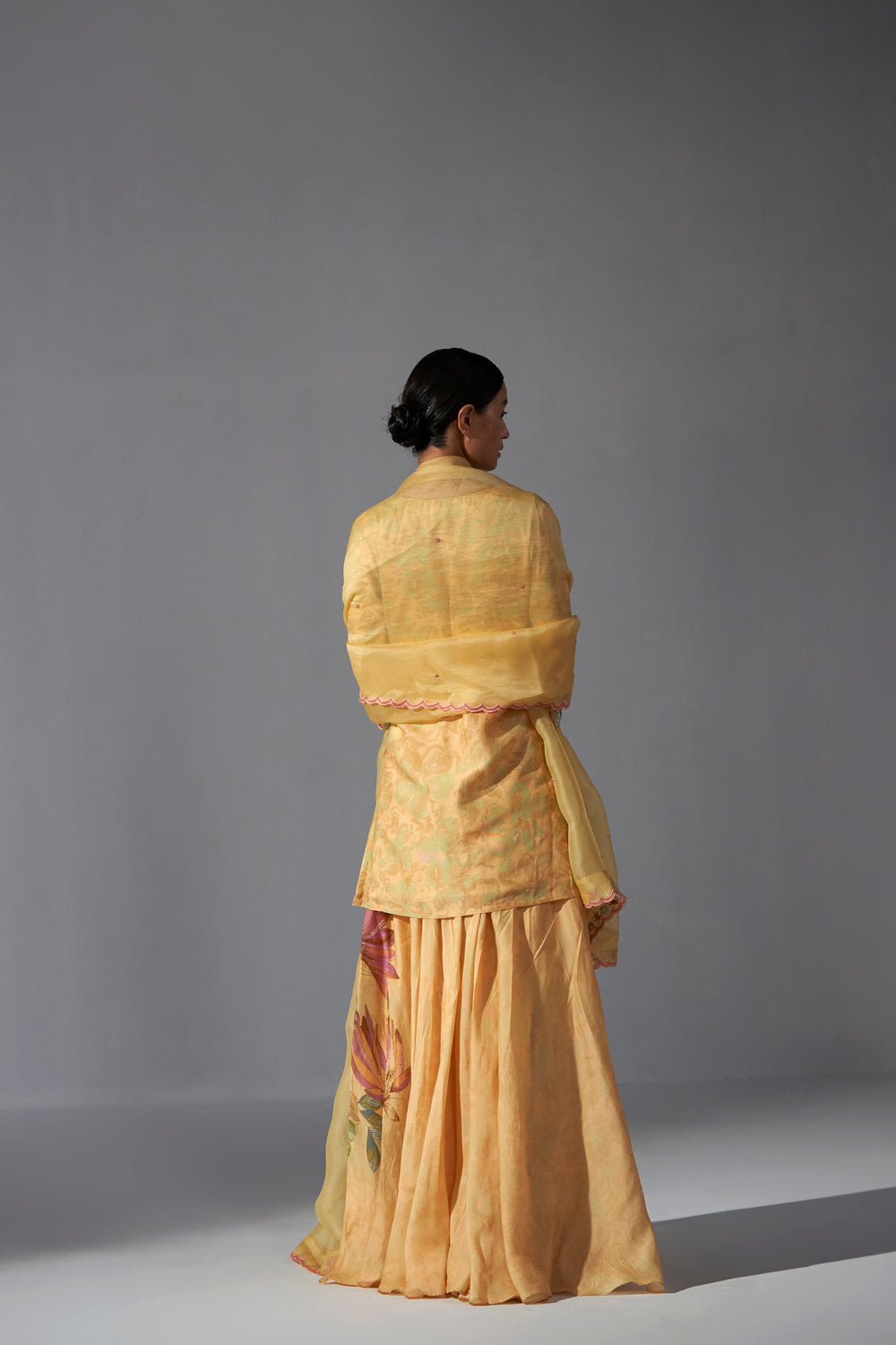Yellow textured heavy top sharara dupatta set
