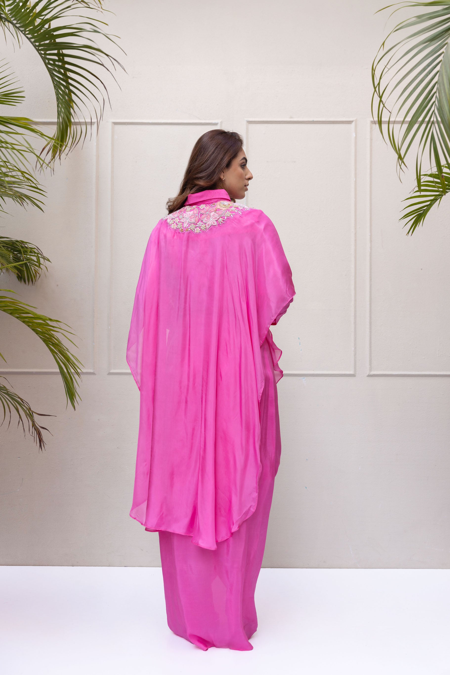 Fuchsia pink draped skirt with cape and shirt