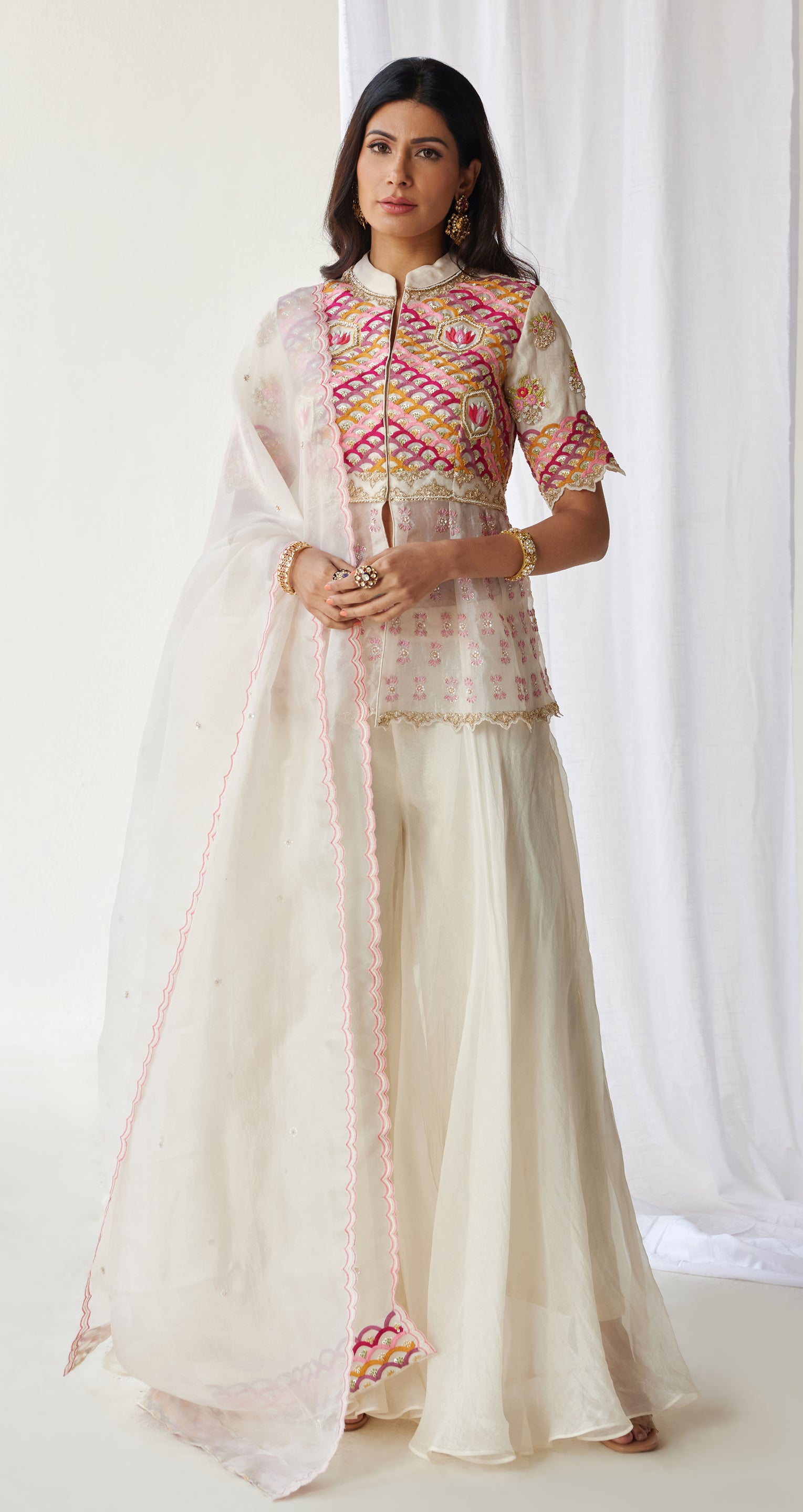 Off white peplum top and sharara with dupatta