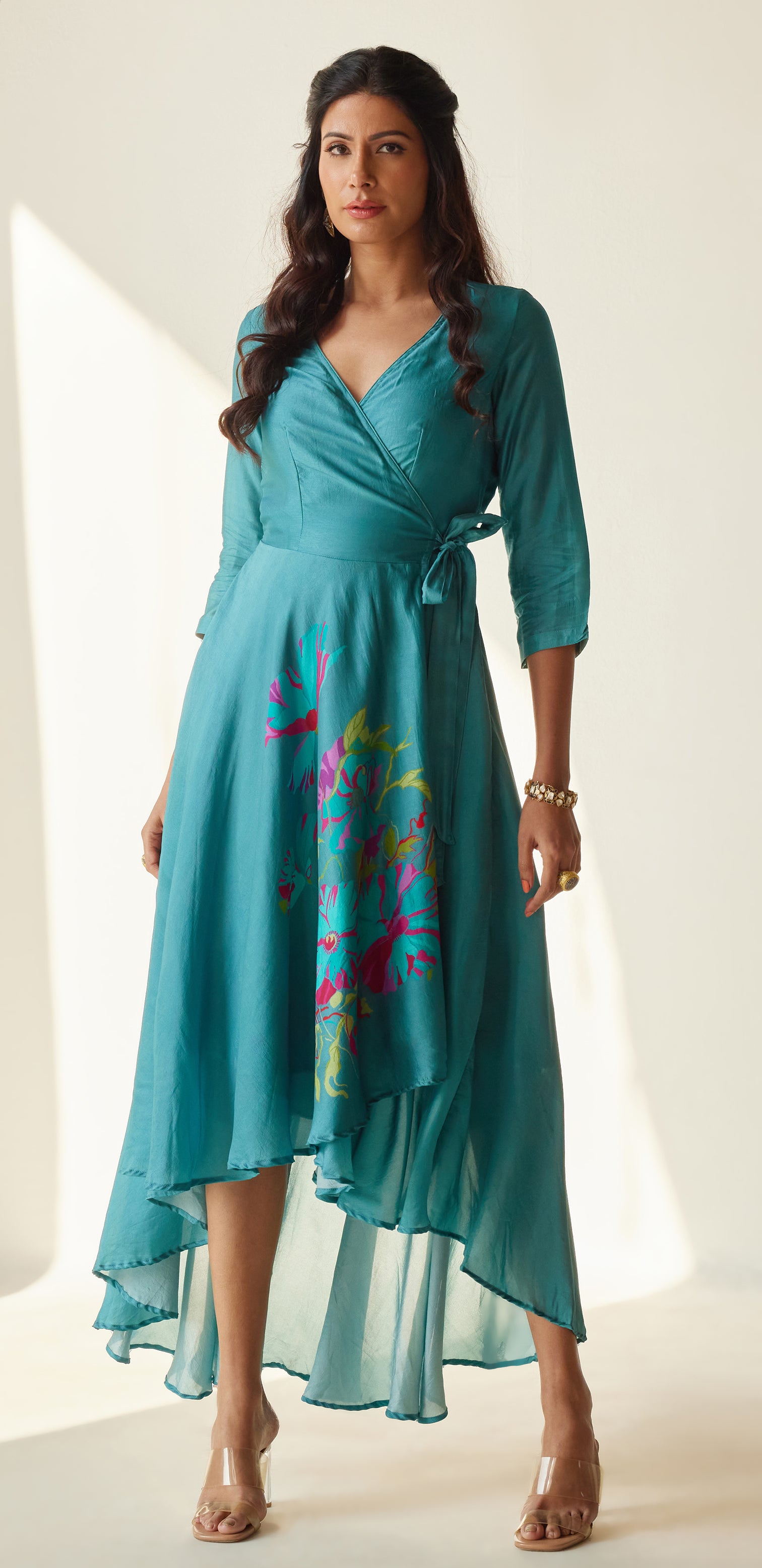 Turquoise wrap dress with floral print