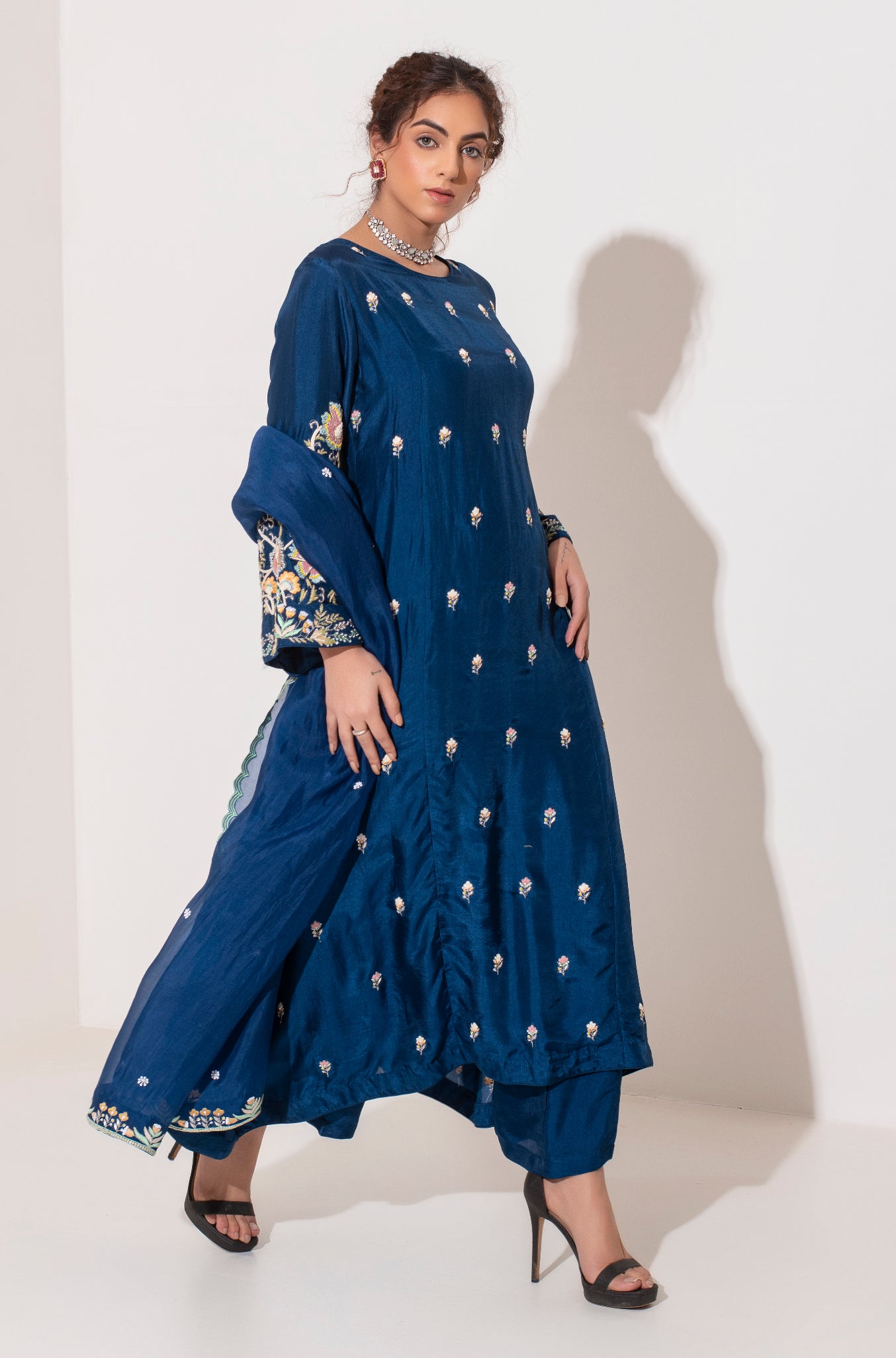 Heavy Resham and zardozi embroidered indigo blue suit with organza dupatta and pants