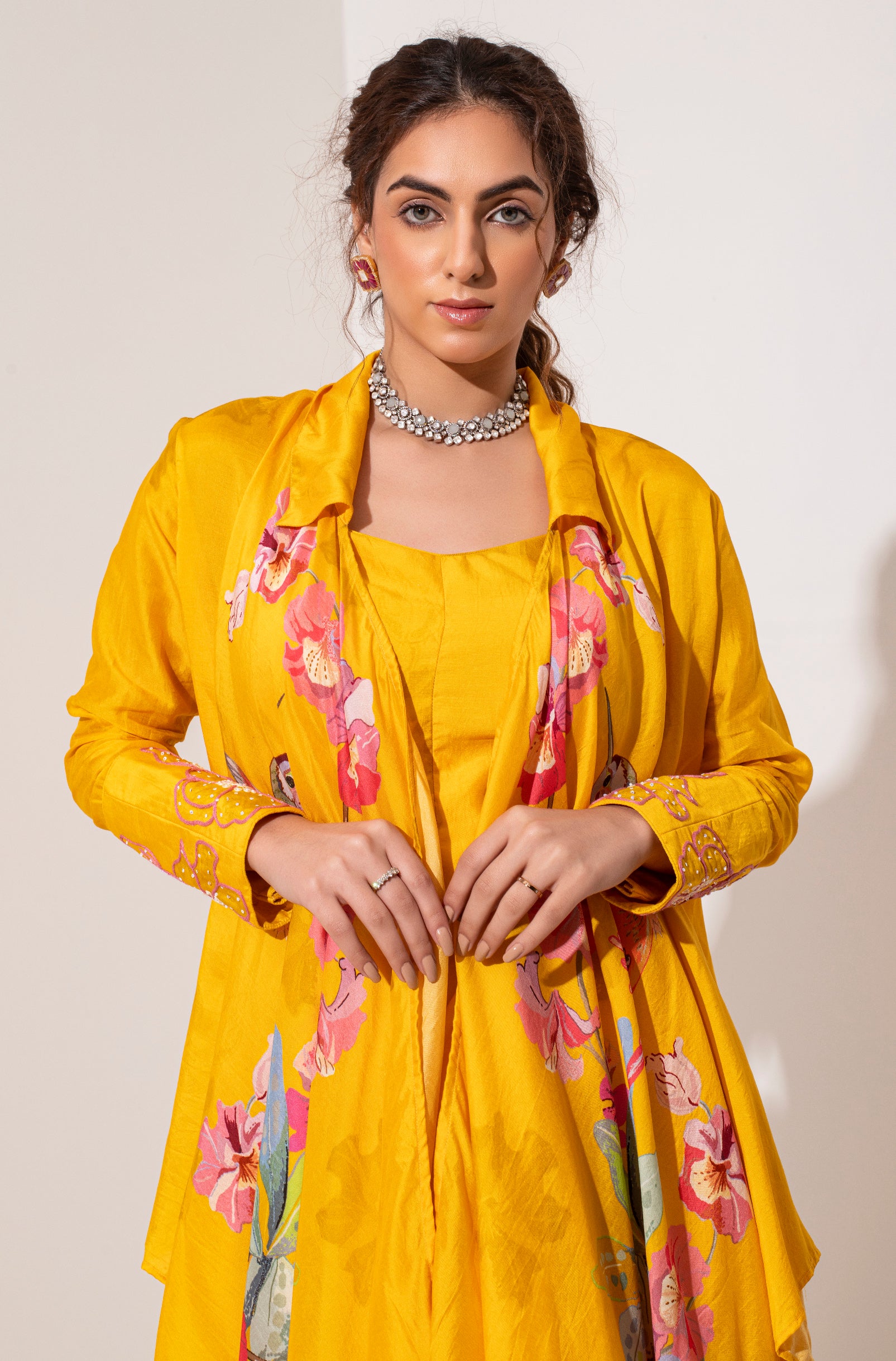 Marigold yellow silk placement printed asymmetric jacket bustier and draped skirt