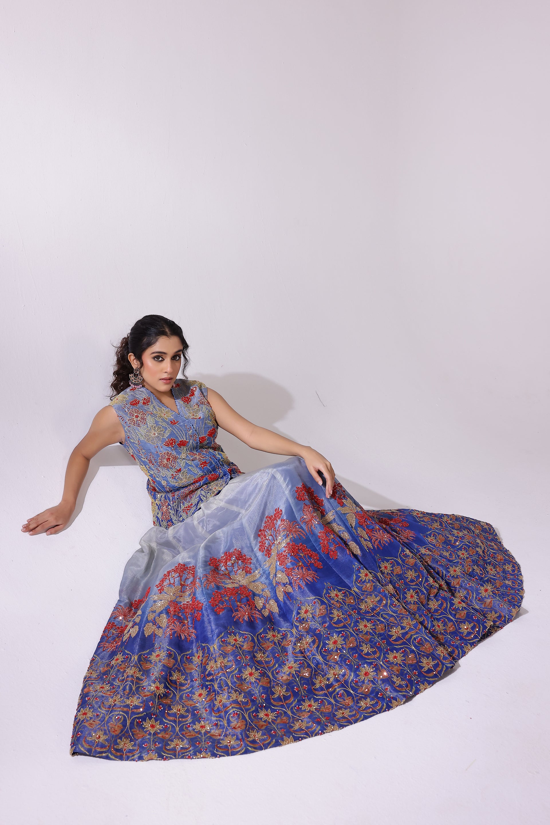 Ombré blue lehenga and waist coat with dupatta