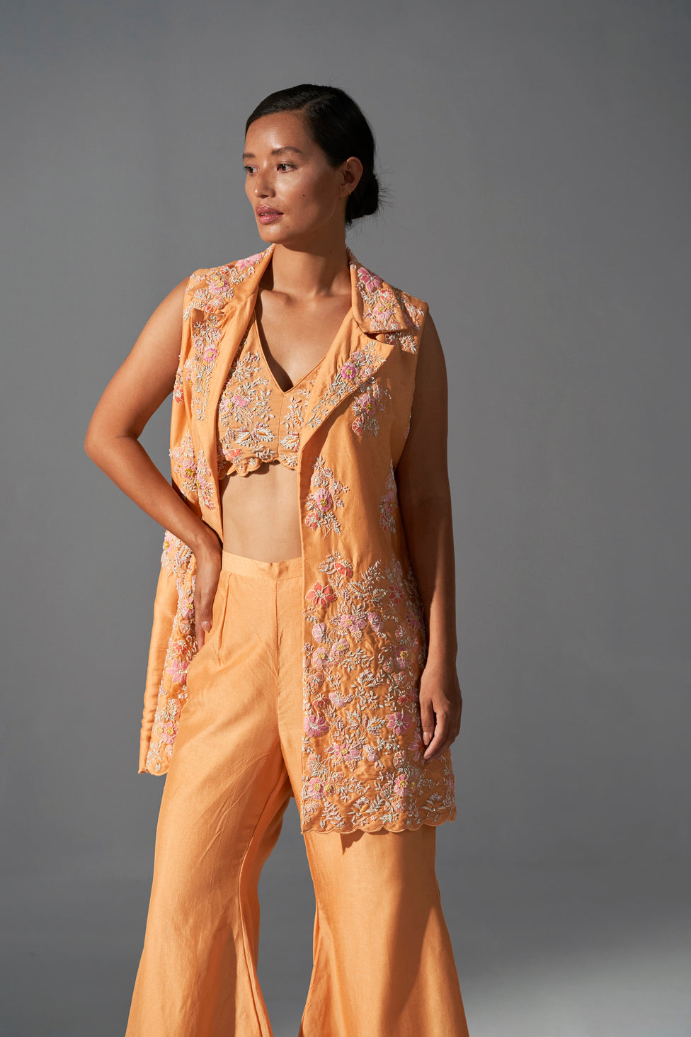 Tangerine zardozi embroidered jacket, bustier and bell bottom set