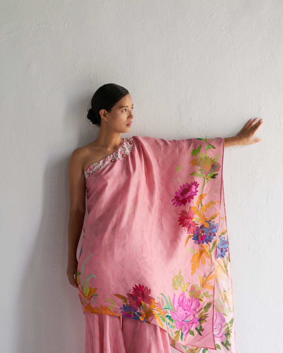 Pink floral printed one shoulder asymmetric top with sharara.