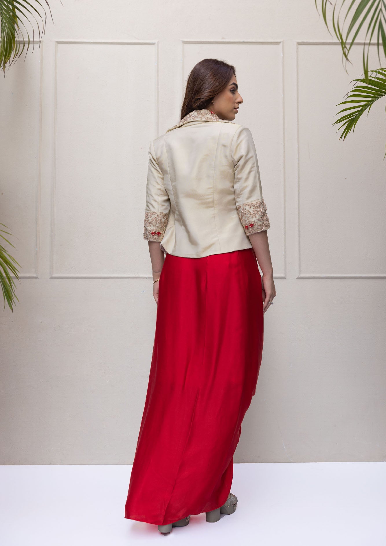 Shimmer Jacket and red draped skirt