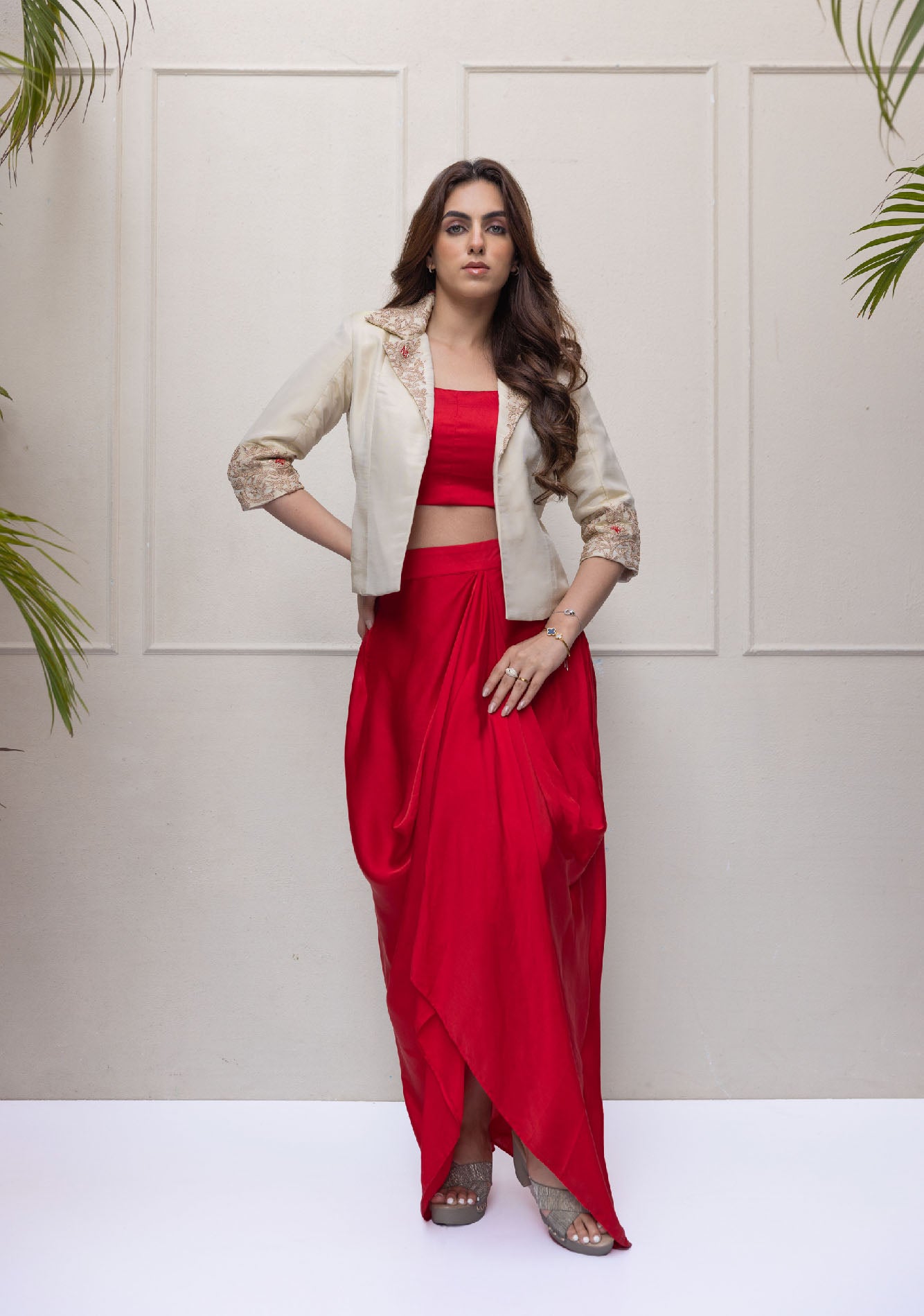 Shimmer Jacket and red draped skirt