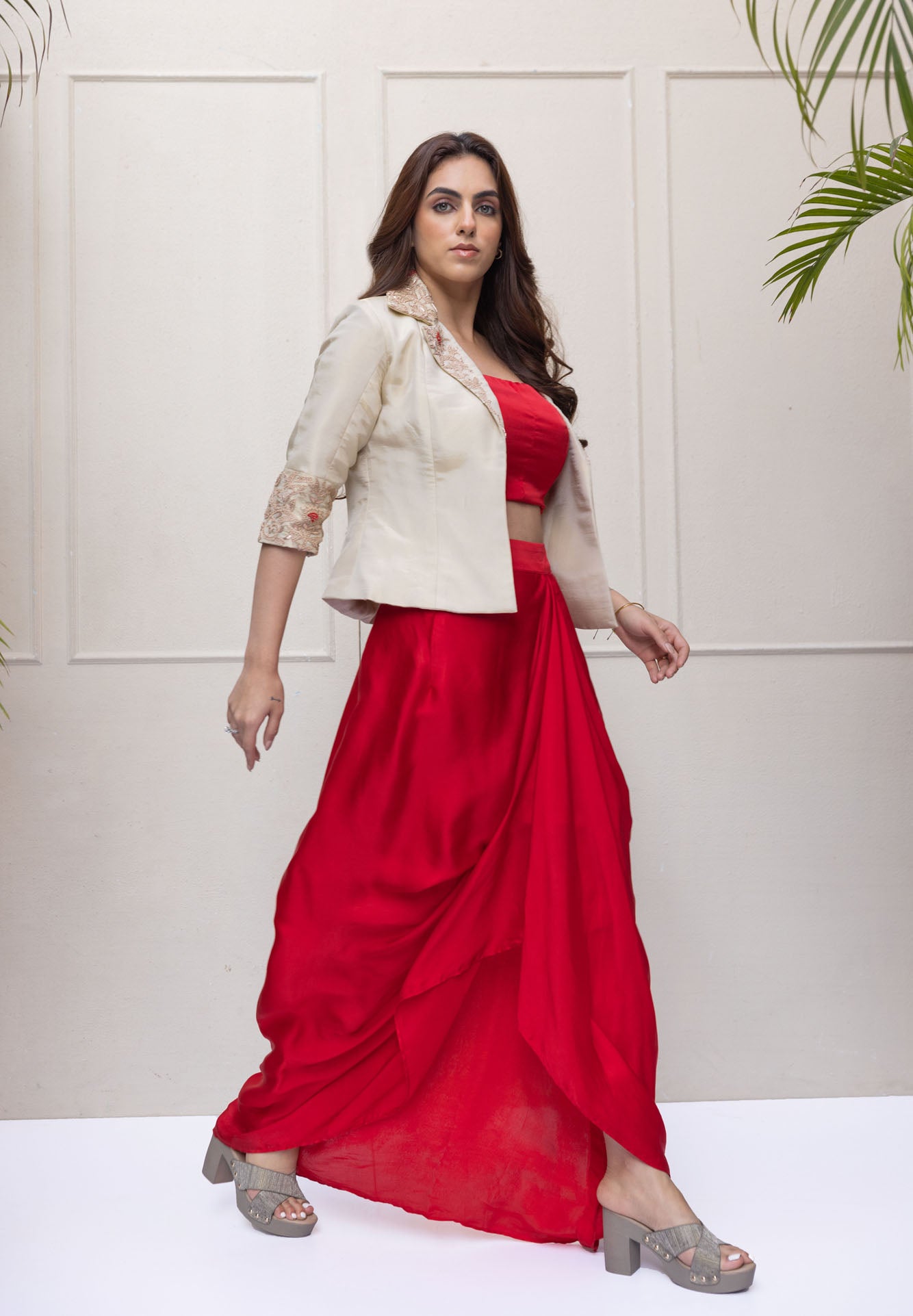 Shimmer Jacket and red draped skirt