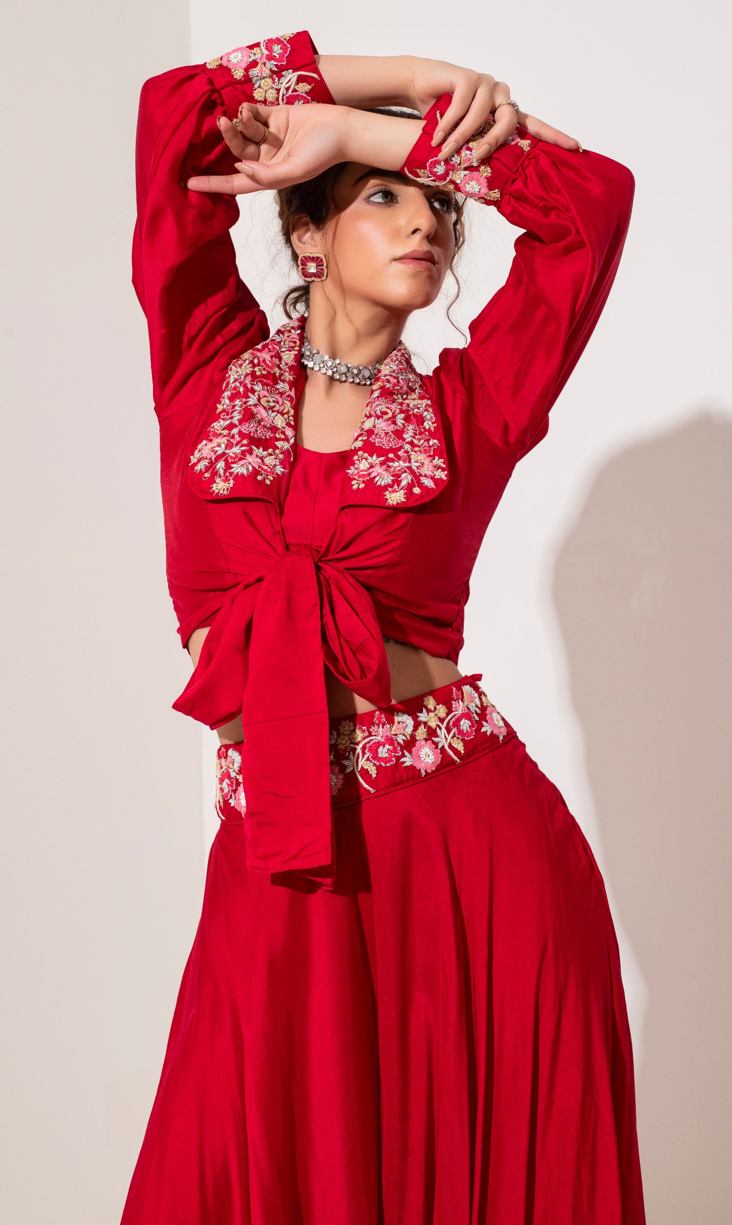 Scarlet red shirt knot top with biased sharara.