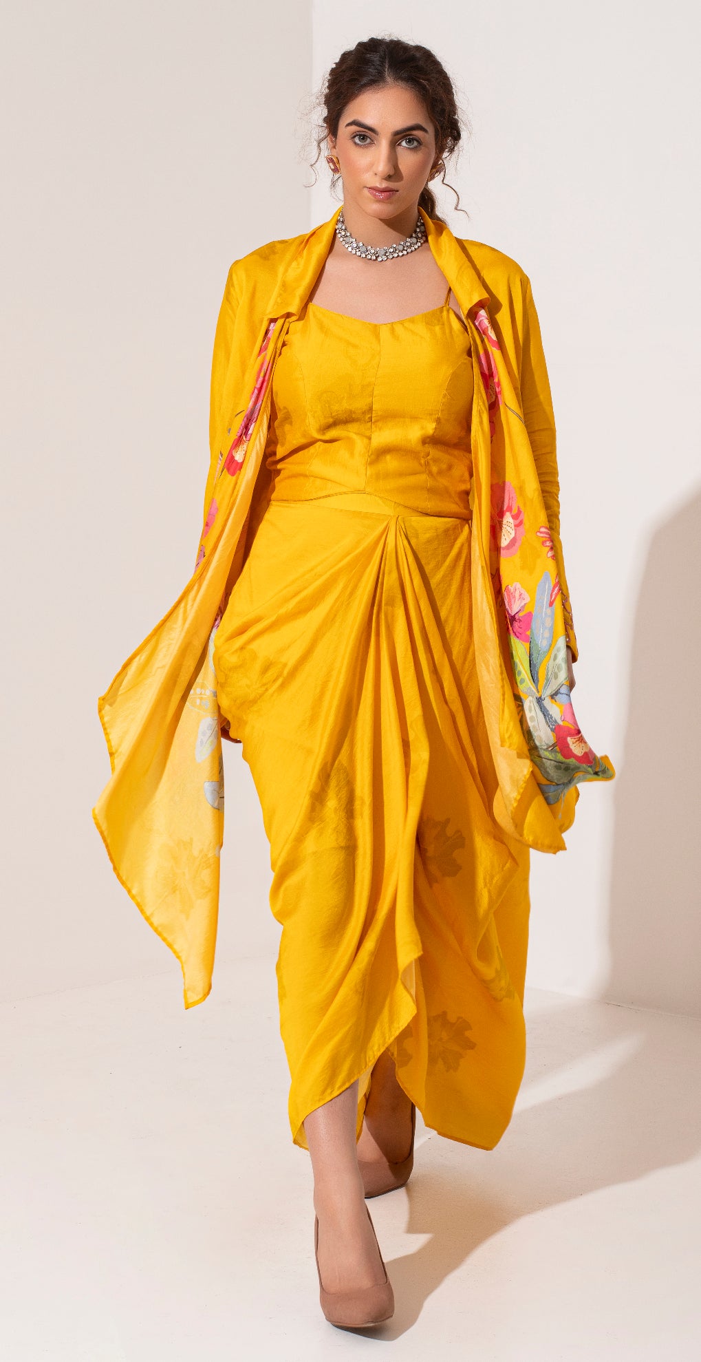 Marigold yellow silk placement printed asymmetric jacket bustier and draped skirt