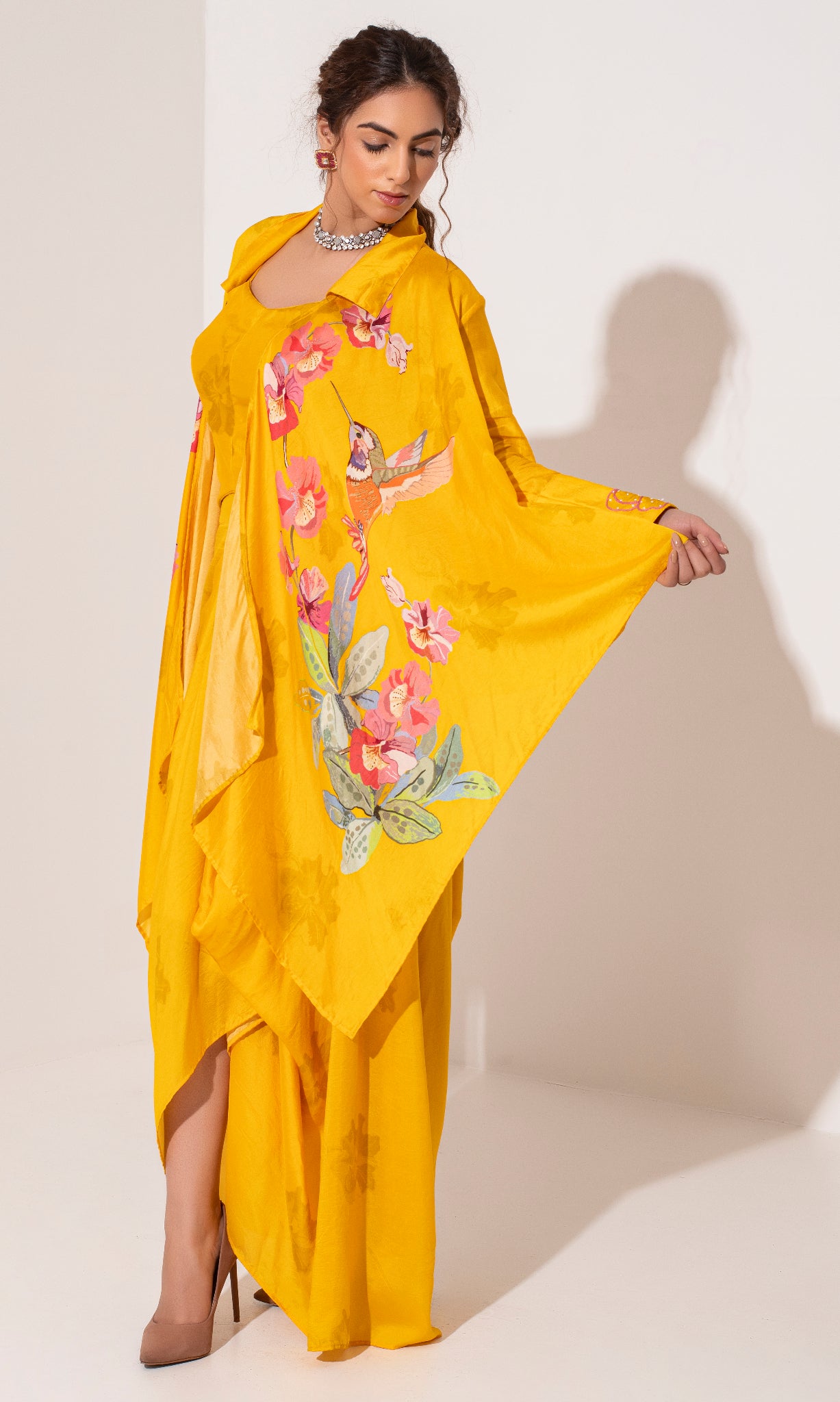 Marigold yellow silk placement printed asymmetric jacket bustier and draped skirt